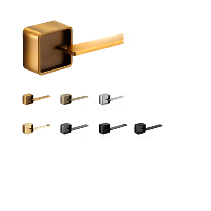 Brass towel bar with multiple hooks on a white background