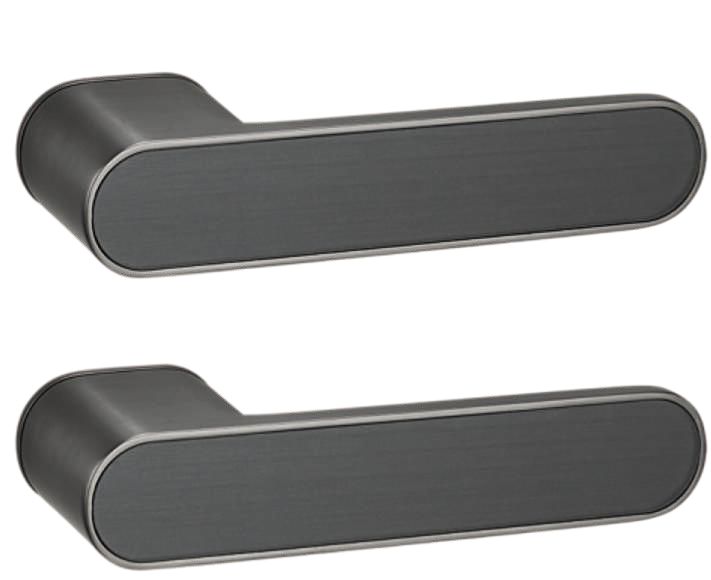 Two metallic door handles on a white background