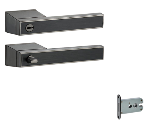 Set of metallic door handles and a latch on a white background