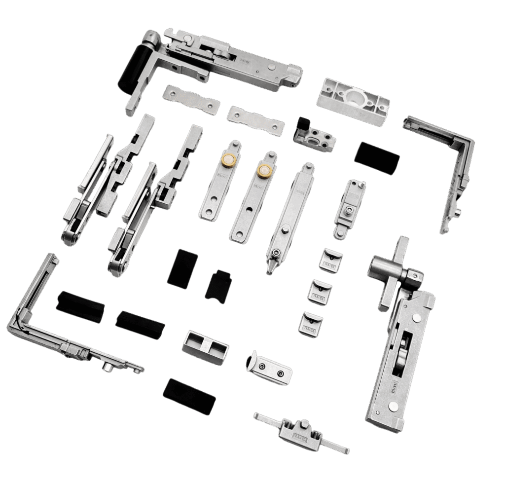 service-1 A comprehensive assortment of silver-gray metal door and window hardware components, neatly arranged on a pure white background. The collection includes various hinges, sliding supports (friction stays), lock points, and a central drive rod. Several parts feature integrated black rubber gaskets, showcasing a professional hardware set for installation.